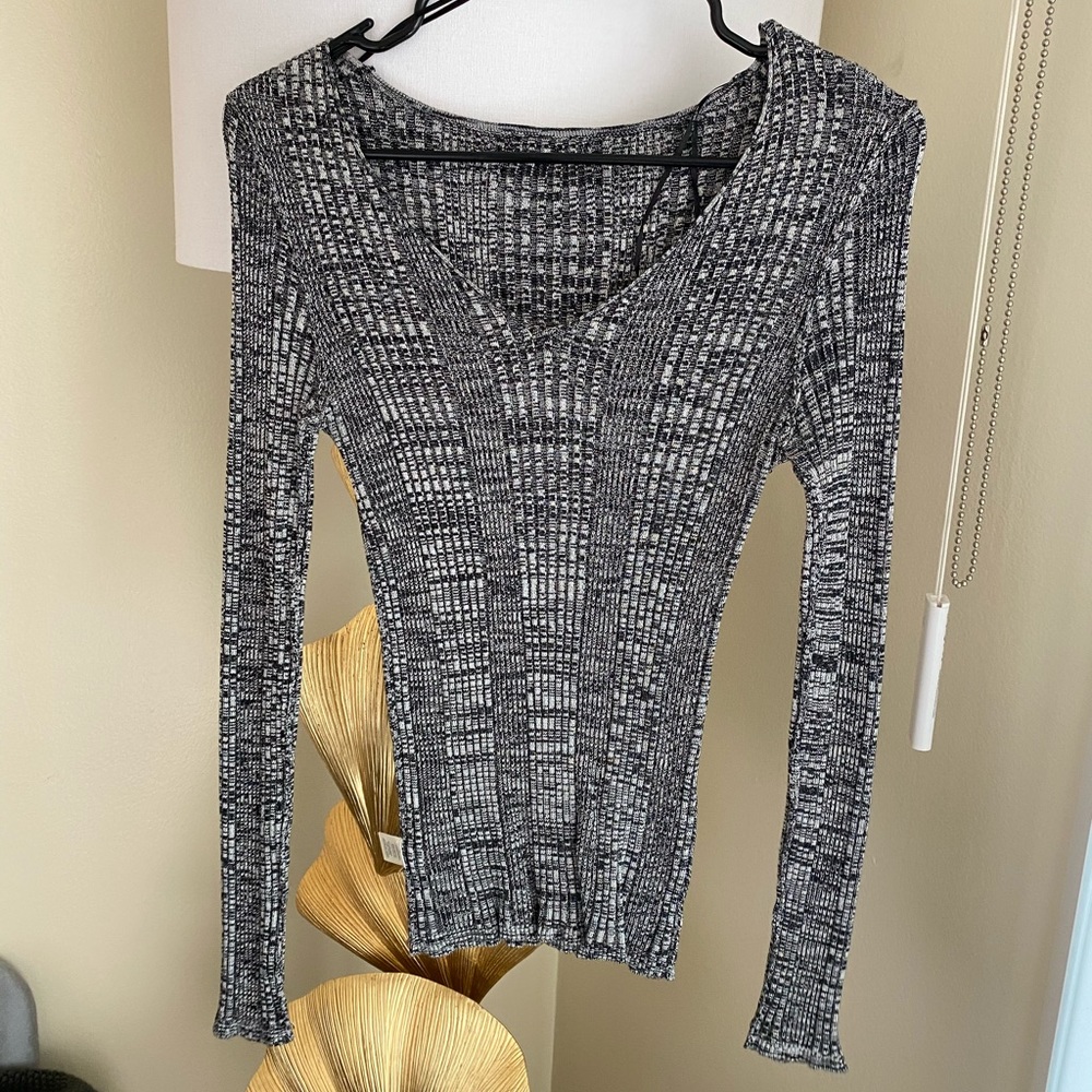 Grey sweater.